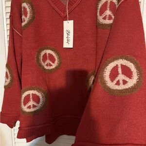 Stylish Rust V-Neck Peace Sweater by Blue Velvet